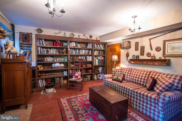 sitting room featuring a chandelier and hardwood / wood-style flooring