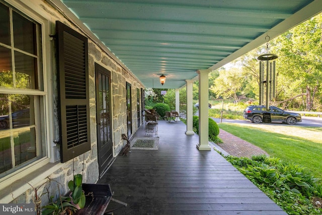 wooden terrace with covered porch