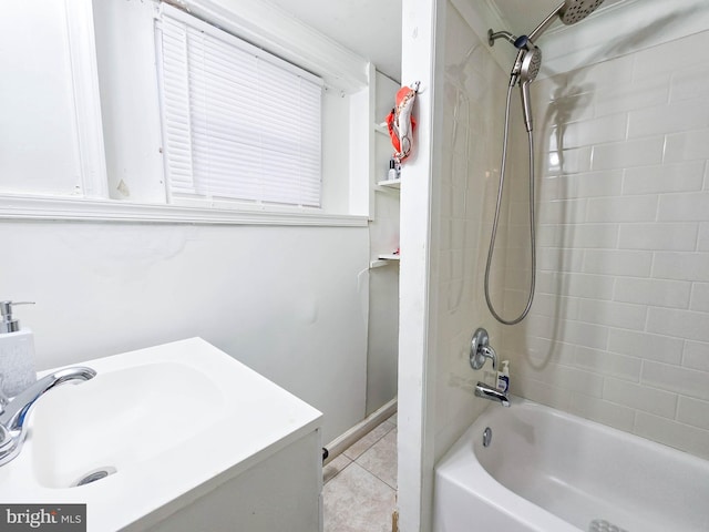 bathroom with tile patterned flooring, sink, and shower / bathing tub combination