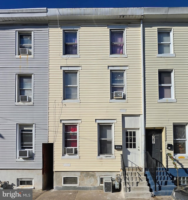 view of front facade featuring cooling unit