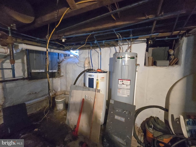 utility room featuring electric water heater