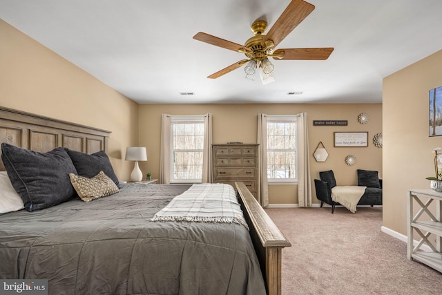 bedroom with ceiling fan and carpet floors