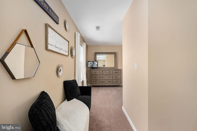 hallway featuring carpet floors