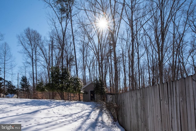 view of yard covered in snow