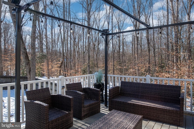 wooden deck featuring outdoor lounge area