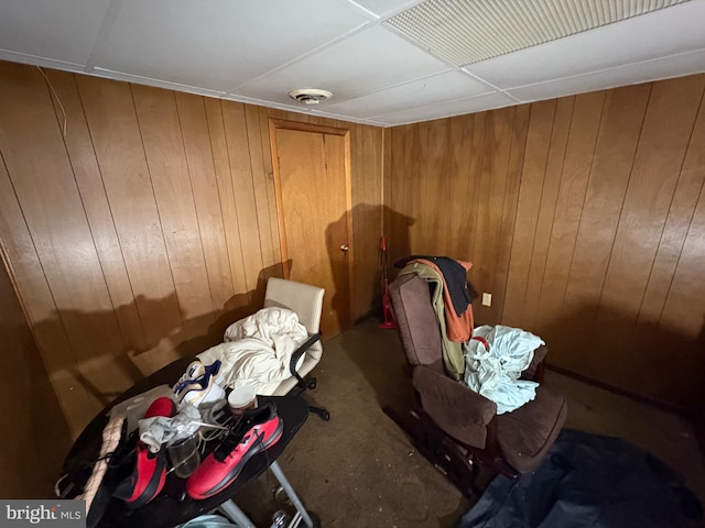 interior space featuring wooden walls