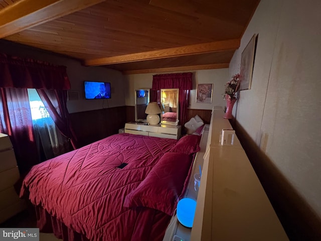 bedroom with wooden ceiling and beamed ceiling