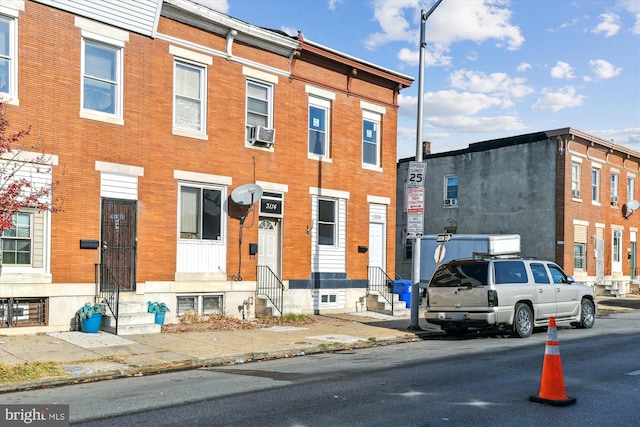 view of building exterior featuring cooling unit