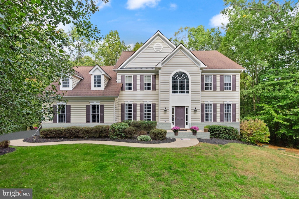 colonial house with a front lawn