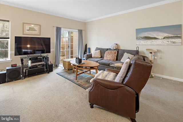 carpeted living room featuring ornamental molding