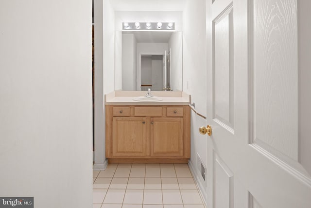 bathroom featuring vanity and tile patterned flooring