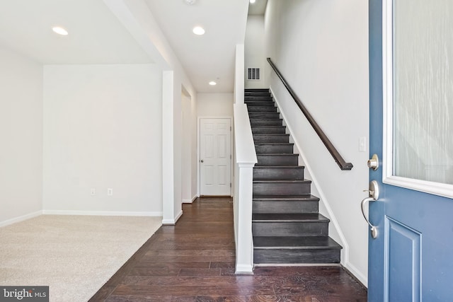 entrance foyer featuring dark wood-type flooring