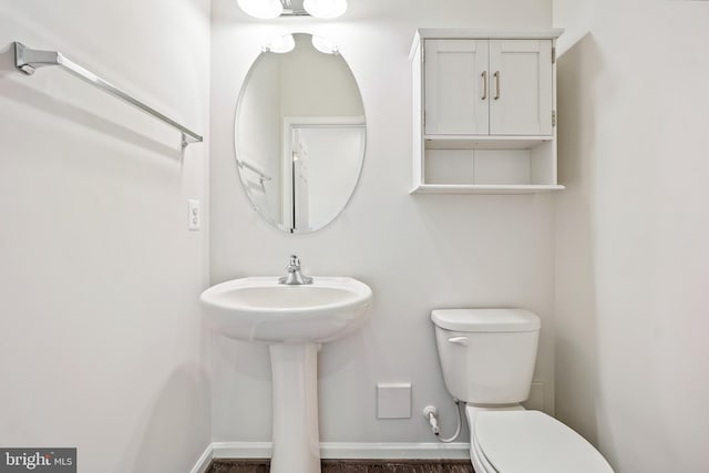 bathroom with sink and toilet