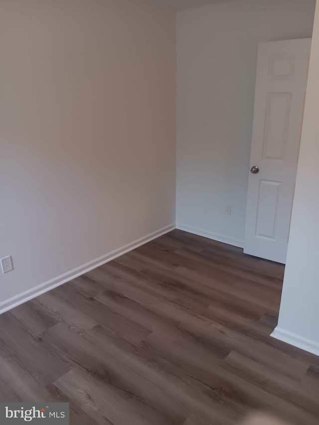 9 Berkshire Rd, Sicklerville, NJ 08081 - spare room featuring dark wood finished floors and baseboards