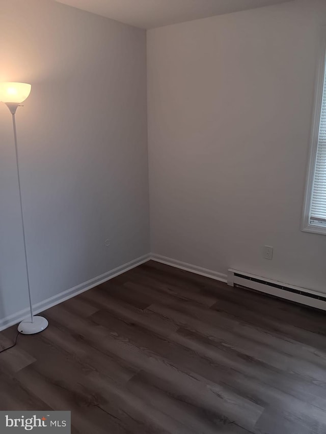 9 Berkshire Rd, Sicklerville, NJ 08081 - empty room featuring dark wood finished floors and baseboards