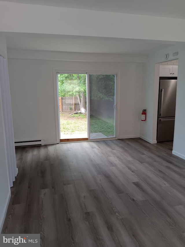 9 Berkshire Rd, Sicklerville, NJ 08081 - unfurnished room with wood finished floors and a baseboard radiator