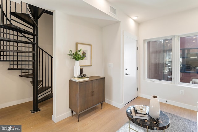 entrance foyer featuring light hardwood / wood-style flooring