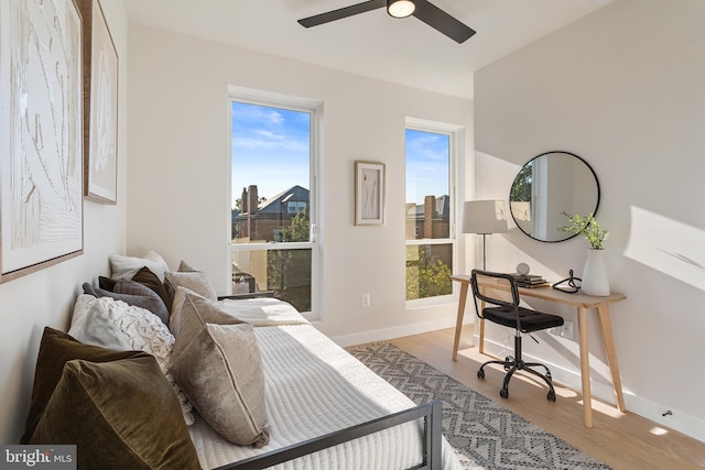 bedroom featuring ceiling fan and light hardwood / wood-style floors