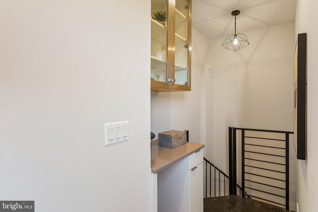 interior space with decorative light fixtures