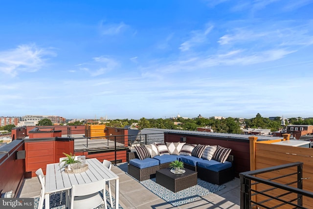 wooden deck featuring an outdoor living space and a patio area