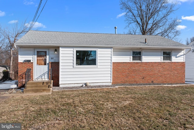 view of front of home featuring a front lawn