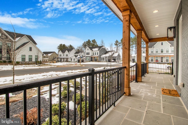 balcony featuring covered porch