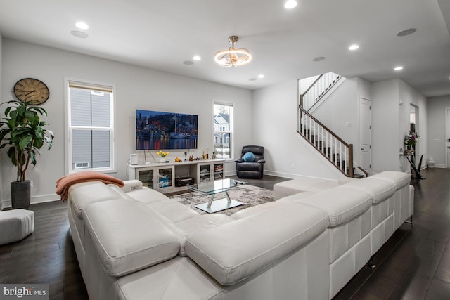 living room with dark hardwood / wood-style floors