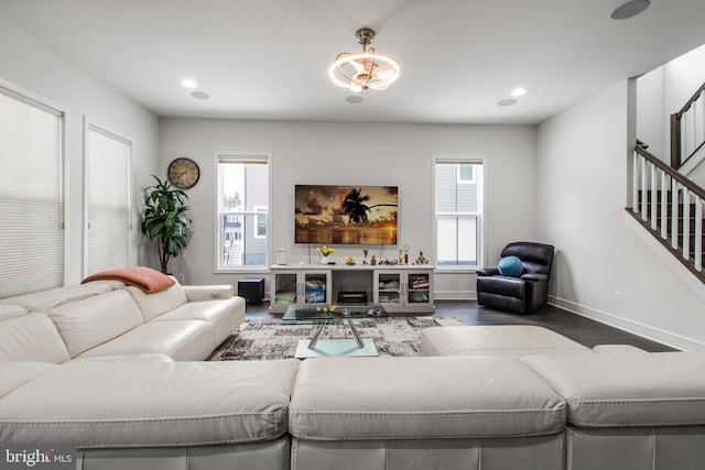 living room with a healthy amount of sunlight and hardwood / wood-style floors