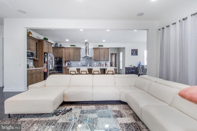 living room featuring dark hardwood / wood-style floors