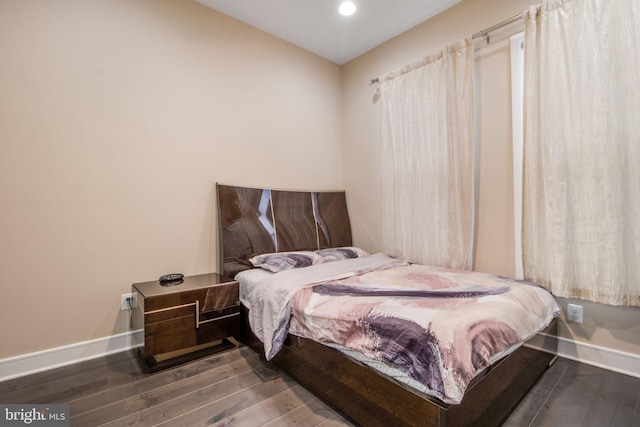 bedroom featuring dark hardwood / wood-style floors