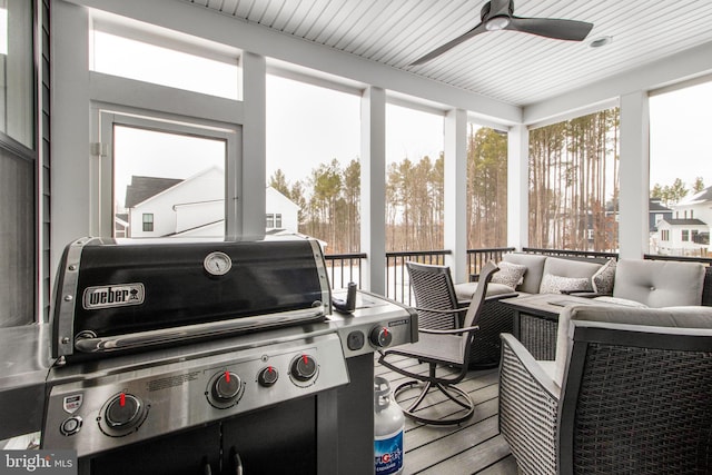 sunroom / solarium with ceiling fan and plenty of natural light