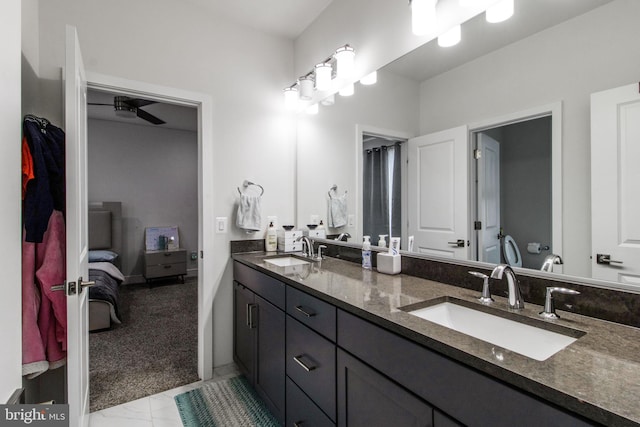 bathroom with vanity and ceiling fan