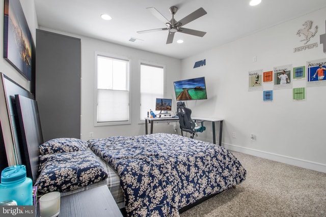 bedroom with ceiling fan and carpet flooring