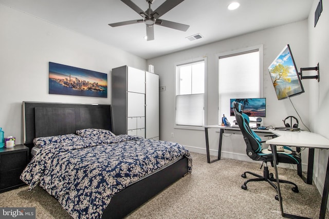 carpeted bedroom with ceiling fan