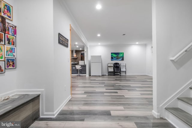 hall featuring wood-type flooring