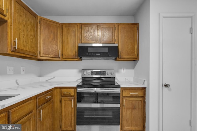 kitchen featuring electric range