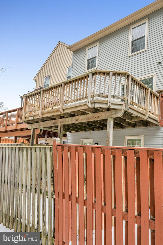 rear view of property with a deck