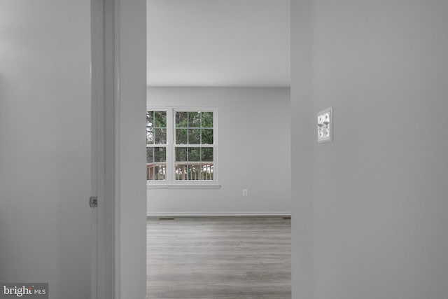 empty room with light wood-type flooring