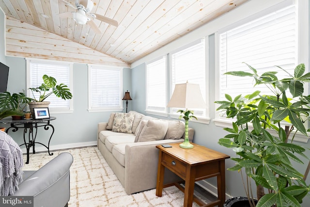 living room featuring vaulted ceiling, wooden ceiling, and ceiling fan