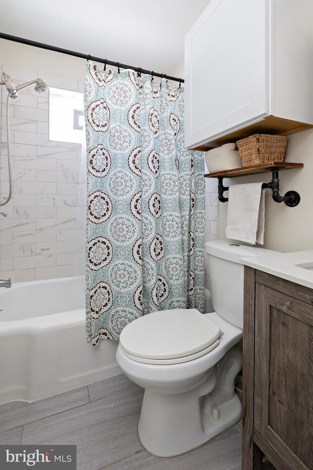 full bathroom with vanity, shower / bathtub combination with curtain, and toilet