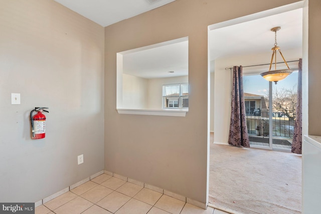 view of tiled spare room