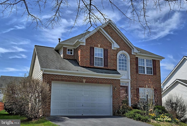 front of property featuring a garage