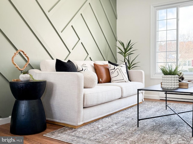 living room featuring hardwood / wood-style flooring and a wealth of natural light