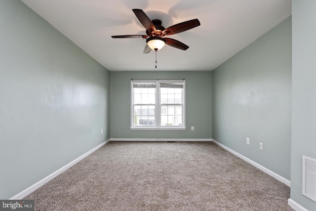 carpeted empty room with ceiling fan