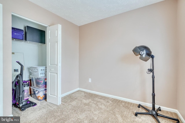 interior space featuring a textured ceiling