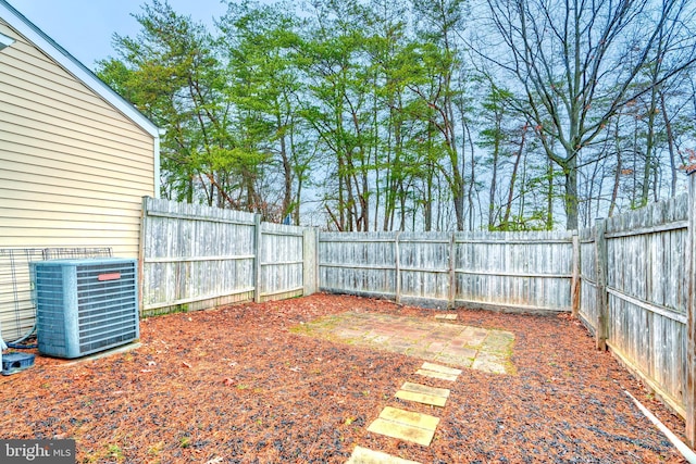 view of yard with central AC unit