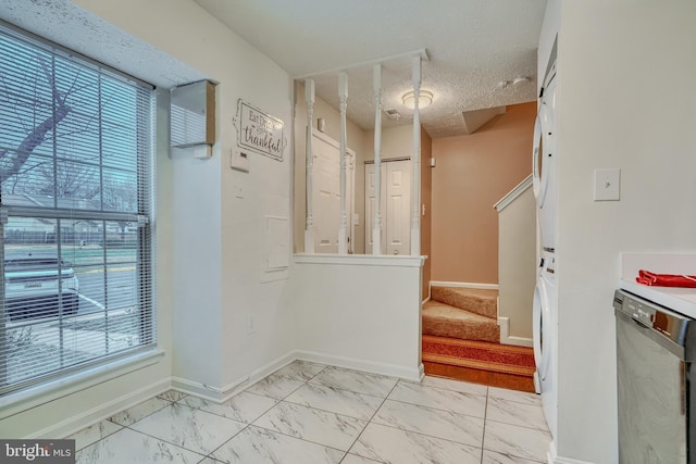 interior space with a textured ceiling