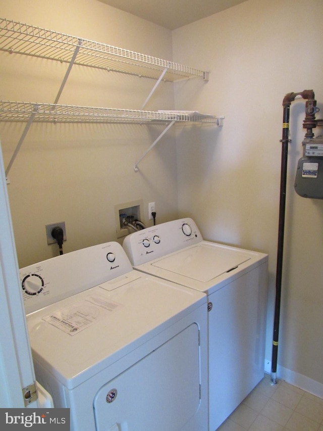 washroom featuring separate washer and dryer