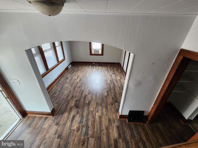 bonus room with cooling unit and dark hardwood / wood-style floors