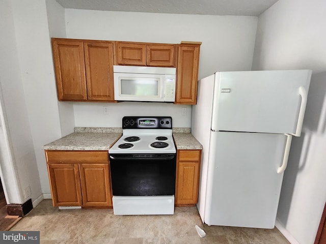 kitchen with white appliances